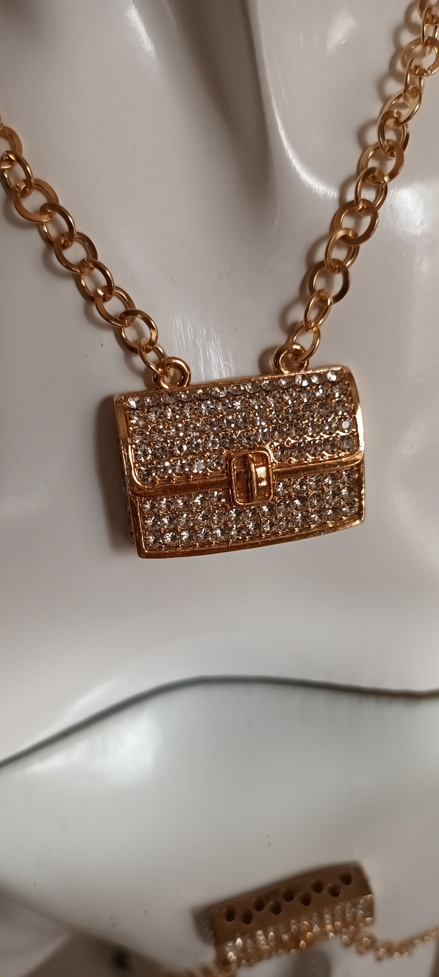 Collier pendentif mini sac élégant avec strass stansparents