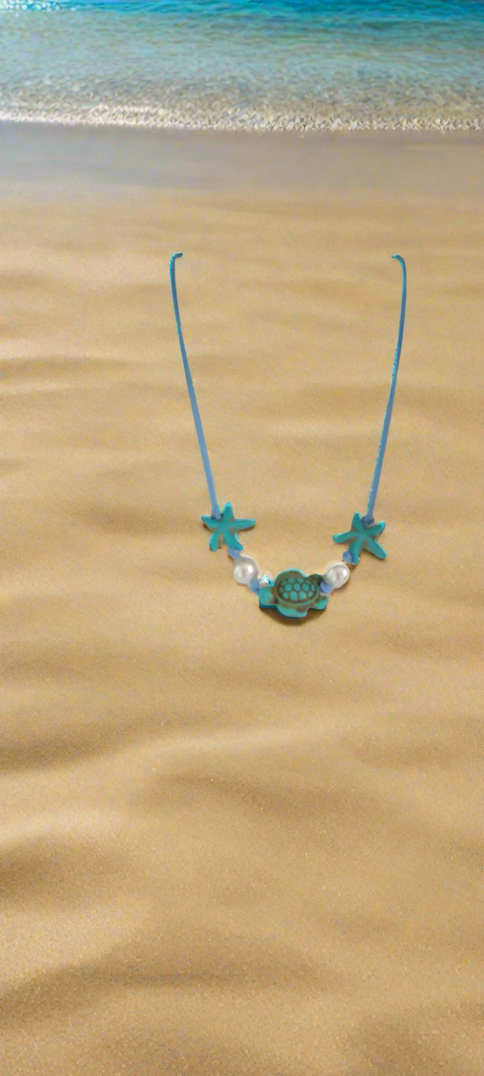 Collier en pierre Tortue et étoiles de mer en turquoise et perles de verres