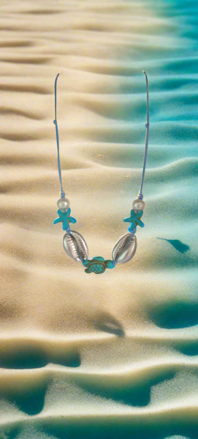 Collier Coquillages ,Tortue en pierre de turquoise et étoiles de mer ,perles de verres