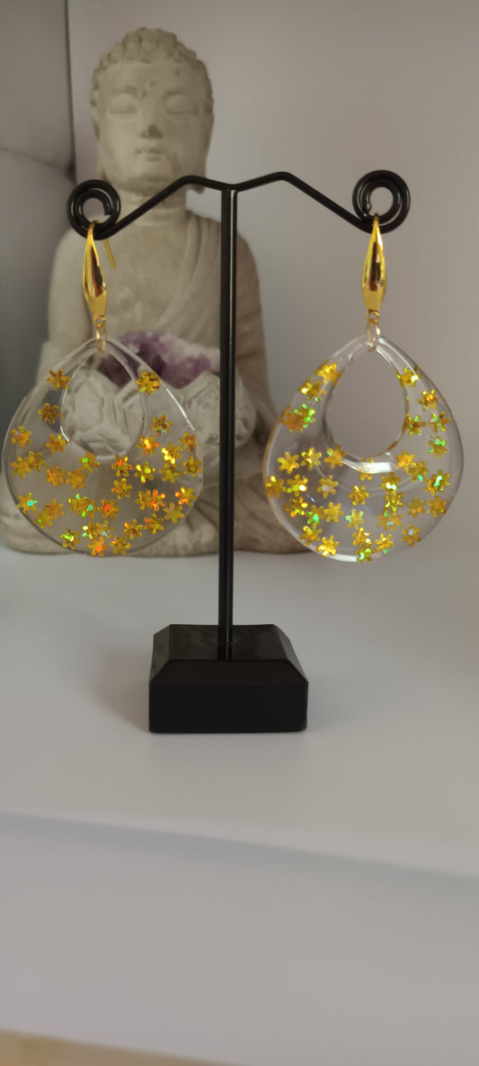 Boucles d'oreilles en résine forme goutte avec inclusion étoiles doré