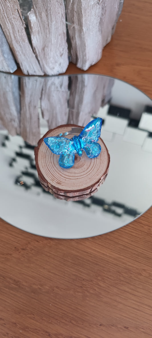 Bague papillon bleu lagon en résine