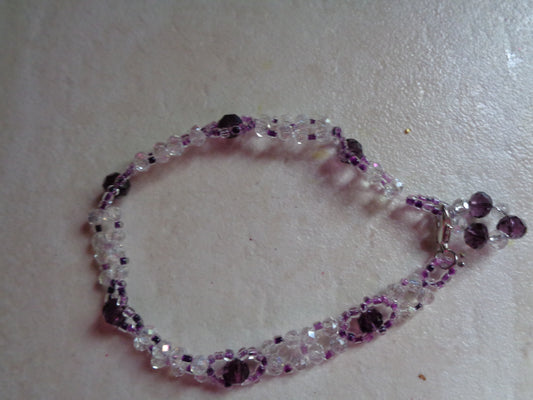 Bracelet en  perle de verre ajustable mauve