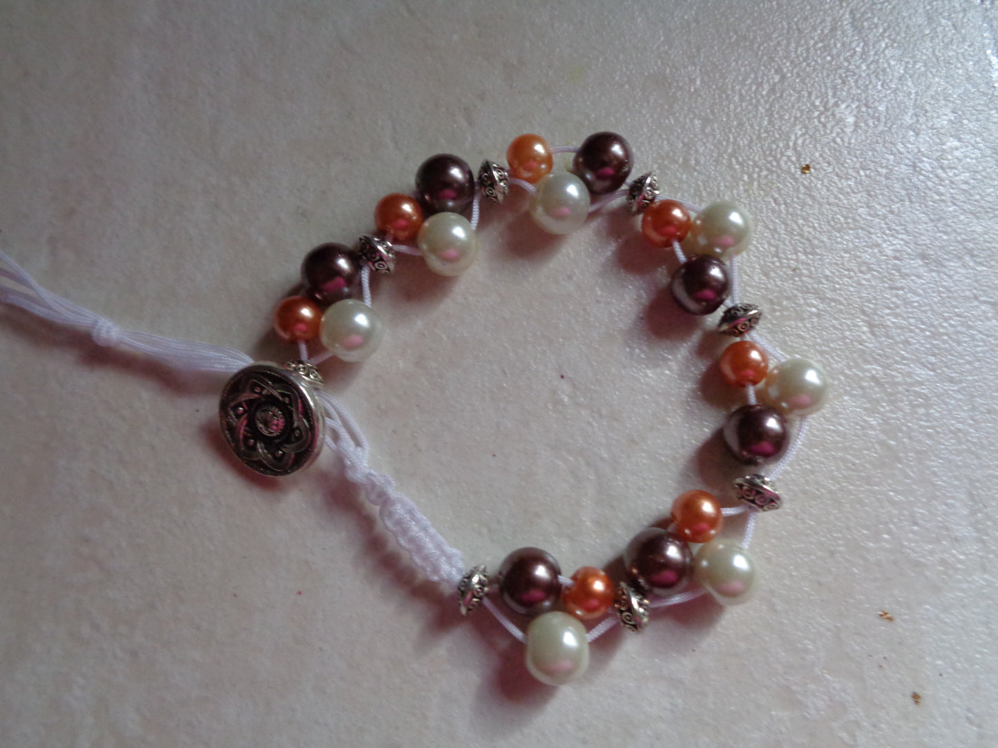 Bracelet en perle de verre ajustable marron, orange, tresser