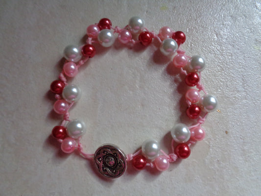 Bracelet en  perle de verre ajustable rose tresser