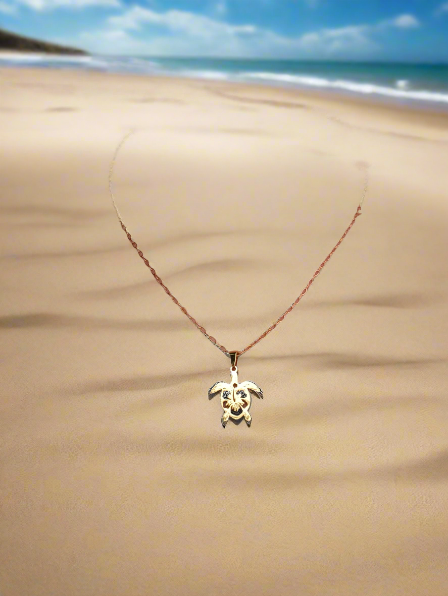 Collier court Tortue et fleur de Tiare